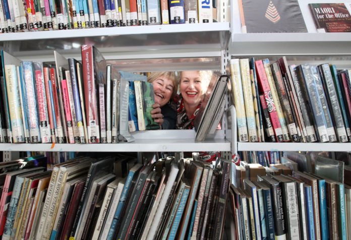 Anna Gully and Sarah Fry from the Elma Turner Library in Nelson prepare to move every single book in the library ahead of its makeover this week.