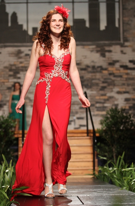 fashion 397 Rebecca McKenzie-Pollock, 17, models a dress from Profile at the Spring Fashion Fling on Saturday night. Right is school principal Cathy Ewing. Photos: Andrew Board.