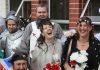 Stoke bride Julia Lines has a laugh with other guests and her husband Brent (centre back) at her medieval-themed wedding on Saturday. Photo: Sinead Ogilvie.