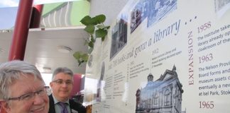 Andrea King and Ian Littleworth looking at the commemorative plaque at Elmer Turner Library at its official unveiling last week. Photo: Sinead Ogilvie.
