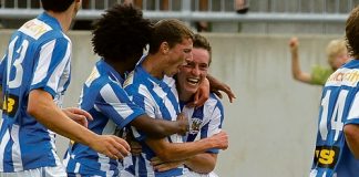 Nelson Falcons players celebrate with goal scorer Harry Tod-Smith, centre, after the substitute scored a late equaliser. Photo: Phillip Rollo.