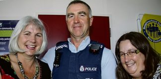 Nelson’s Peter Crins with the cake he won for helping sign up more streets to Neighbourhood Support than any other community constable. He is pictured with baker Beverley Ewbank and Neighbourhood Support coordinator Kim MacDonald. Photo: Sinead Ogilvie.
