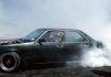 Burnout comp up in smoke Jonathan Sutton films, with a face-full of excitement, in the passenger seat of Caleb Burgess’ Nissan Laurel during the Nelson Car Show’s burnout competition on Sunday. Photo: Phillip Rollo.
