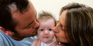 Baby Jackson Helliwell with his parents Dion and Brenda. Photo: Phillip Rollo.