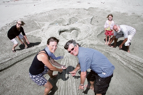 saturday 003 Julie Flintoff, Gaye, Graeme and Stella Bloomfield, 6, with Brian Flintoff after completing their entry into the Hyundai sandcastle competition on Tahunanui Beach on Saturday. Photo: Sinead Ogilvie.
