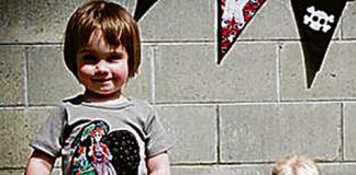 Jem Coursey models his mother Katie’s range of baby clothes. Photo: Sarah Ryland
