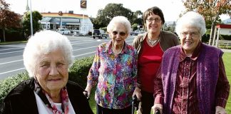 Kensington Court residents Daphne Stephens, Beverley Thompson, Kay Price and Joan Price hope the council will put a pedestrian refuge on Main Rd Stoke so they can cross the road to catch the bus. Photo: Andrew Board.