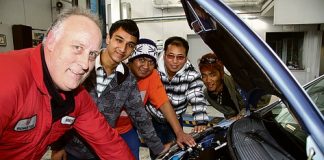 Martin Stevenson, service technician for Bowater Honda, with Bharat Timsina, Yam Magar, Paul Suan and Cinpu Khupson. Photo: Sinead Ogilvie.