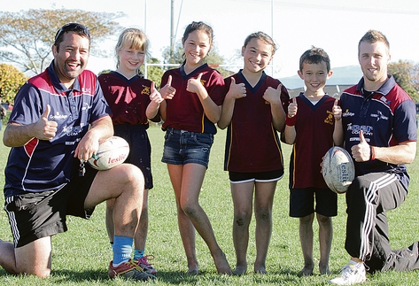rugby 024 Tasman Rugby Union’s Kahu Marfell and Shawn Begg supporting the new campaign to reward volunteer referees of junior rugby. With them at Greenmeadows are Stoke School ripper rugby players Nicole Byrman, 9, Latia Grey, 10, Tanykah Wilson, 10 and Matachi Ray, 8. Photo: Andrew Board.