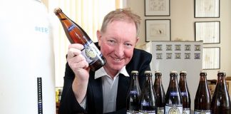 Nelson MP Nick Smith with his home brew which he will be serving to delegates of the National Party Conference in Nelson this weekend. Photo: Andrew Board.