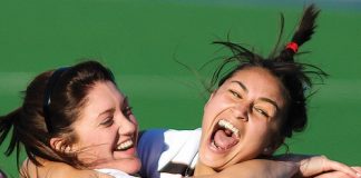 Tasman women’s players Hannah Saul and Tanya Hawley celebrate winning Saturday’s division one final in penalties. Photos: Phillip Rollo.