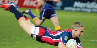 Tasman winger Mitchell Scott dives over to score the Makos sixth try. Photos: Phillip Rollo.