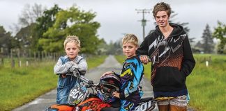 Nine year old Luca Palmer-Donald will be competing at the New Zealand motocross championship on the North Shore this weekend. His twin brother Nico, left, and older brother Jake, 16, will be there supporting him. Photo: Phillip Rollo.