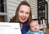 Marianne Hart-Biggs with her son Alfie Baron Biggs and his birth certificate after his middle name was initially rejected by Department of Internal Affairs. Photo: Andrew Board.