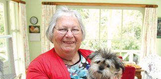 Katrina Erceg with her dog Angus in her Teal Valley home. Katrina has had a traumatic 2013. Photo: Andrew Board.
