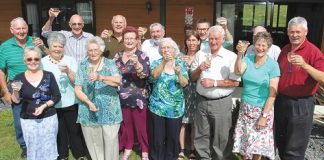 Waimea Village residents committee members, new board members and other supporters of the residents celebrate buying the village from Michael and Carolyn Wright. Photo: Andrew Board.