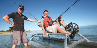 Local fishermen Jason King, left, and Sam Guo have built pedal-powered fishing boats at Rabbit Island. Photo: Simon Bloomberg.