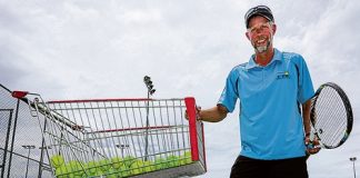 Tasman Tennis Club member Simon Richardson has gone about making a tennis ball machine out of a supermarket trolley. Photo: Phillip Rollo.