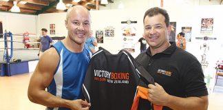 Monty Betham is presented with a Victory Boxing Club hoodie by Paul Hampden when he visited the gym last week. Photo: Andrew Board.