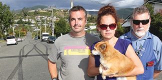 Chris and Bonnie Fabish with neighbour John Scowan on Maitland Ave where burn outs have them concerned over the safety of residents on the street. Photo: Andrew Board.