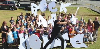 Students from Brightwater School join Richmond Mall manager Belinda de Clercq, musical directors John Phillips and Paulette Nott, and Hope School principal Dave Pritchard to announce the Rock da House combined schools musical initiative. Photo: Phillip Rollo.