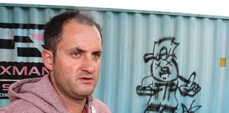 Pro Karts owner Nick Fowler says the vandalism at the back beach has been getting worse. Less than a month after having his building burnt down, his shipping container was tagged with graffiti. Photo: Andrew Board.