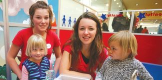 Eventful Kids supervisers Anika Kemp, left, and Jordan Livingston, having fun with Esther Dunne and Emilia Banks in the Richmond Mall on Monday. Photo: Simon Bloomberg