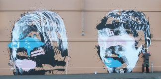 Elliot O’Donnell, known as Askew One, completes his street art piece on Morrison Square on Selwyn Place last week.