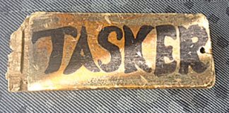 A piece of the recovered memorial cross, stolen from Tahunanui Drive.