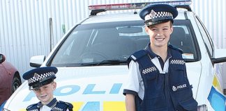 Brothers Blake, 5, and Hayden Bruning, 9, get an early taste of the Nelson police open day this Saturday.