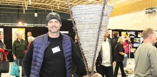 Nelson artist Michael MacMillian with one of his pieces at the Nelson Art Expo over the weekend. Photo: Alicia Burrow.
