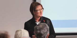 Nelson City councillor Gaile Noonan addresses the crowd that came to hear the results of a residents survey about Stoke last week. Photo: Jessie Johnston