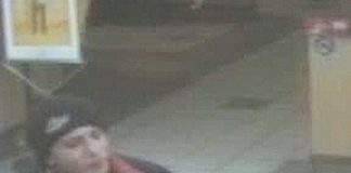 A security camera image of a man police would like to speak with, regarding the Brook St store robbery.