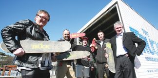 The Breeze breakfast host Breffni O’Rourke, left, with the Car Company’s Oliver Brown, second right, and Shane Drummond, right, with the Nelson Youth and Community Trust’s David Atoa, second left, and Nathan Telfer aboard The Truck. Photo: Simon Bloomberg.