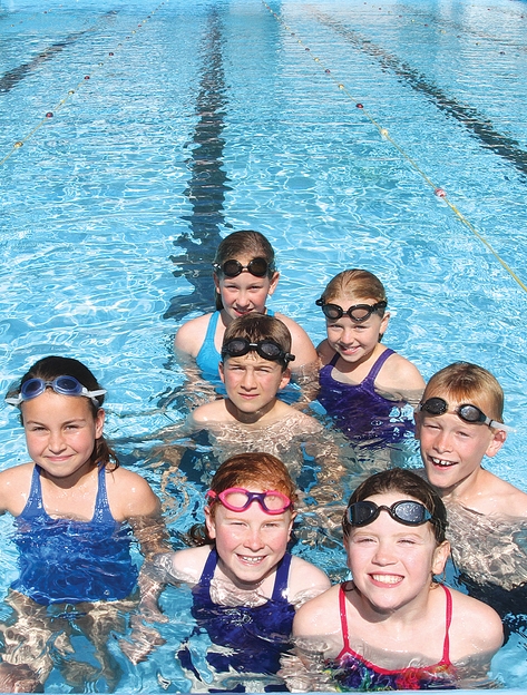 poolopening Members of the Nelson South Swimming Club get an early dip in the Hampden St pool which is now open for the summer. Photo: Andrew Board.