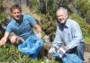 Community groups clean up our beaches Michael Fox and Malcolm Ross from the Stoke Tahunanui Rotary Club cleaning up the coastline around Monaco. Photo: Jessie Johnston.