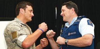 Sergeants Justin Carter and Steffan James stare each other down at the After the Bell fundraiser at the Rutherford Hotel on Friday. The pair were one of four fights announced for the Fight 4 Victory charity boxing event next Easter. Photo: Evan Barnes/Shuttersport.