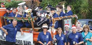 Members of the Nelson Brass Band travelled through the streets of Stoke and Richmond last week, playing Christmas Carols. Photo: Monique Bergman.