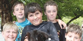 Hampden St School students with Socks the cat at the school last week. They students are from left; Jakob Fletcher, Jack Burrows, Rhys Sharland, Reegan Lawton and William Daniell. Photo: Andrew Board.