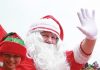 Santa waves to the thousands who turned out to see him at the annual Nelson Santa Parade, on Sunday. Photo: Andrew Board.