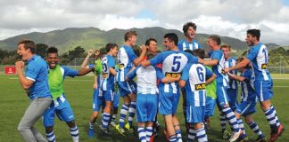 The Nelson Marlborough Falcons celebrate after hearing they won the ASB Youth League after playing their game against Team Wellington at Memorial Park in Petone on Sunday. Photo: Dave Lintott.