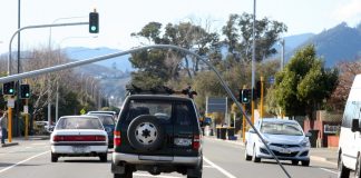 Rubbish truck flattens light pole